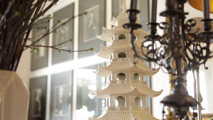 a white miniature Chinese temple perfect as an interior