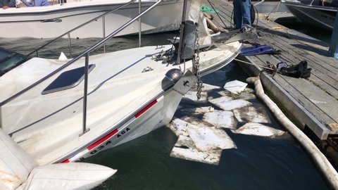 Bandon , Oregon / United States - 08 02 2019: Sunken boat half retrieved in Bandon Oregon