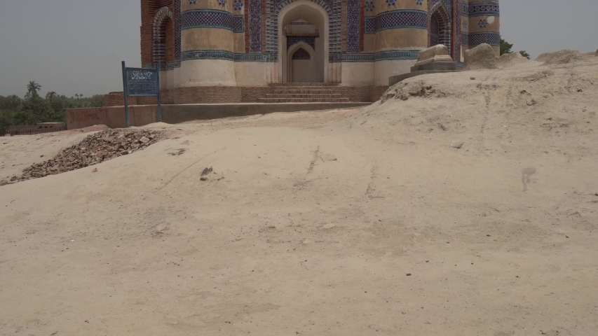 TRANSLATION: "Muslim Prayer Sentences". Uch Sharif Jawindi Bibi Tomb Breathtaking Picturesque Frontal View on a Sunny Blue Sky Day