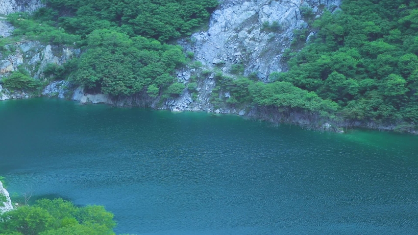 Beautiful colored pools and mountains nicknamed the new Grand Canyon in Chonburi, Thailand.
