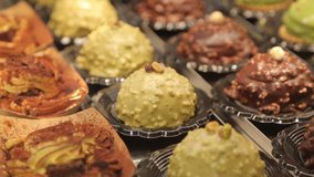  cupcakes with chocolate frosting. muffins on the counter of the store. - Powered by Shutterstock - Get 15% off with code: PIKWIZARD15