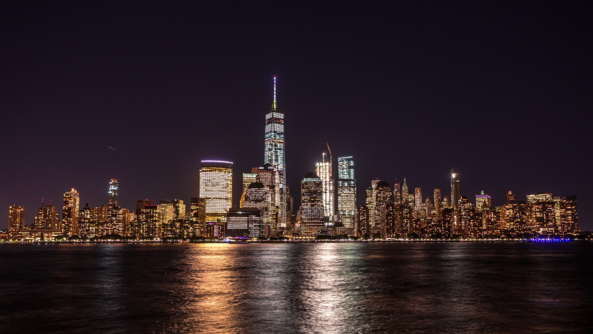 New York, USA - September 22, 2016 : Lower Manhattan, Wall Street view from New Jersey time lapse at night | Shutterstock HD Video #1037096210