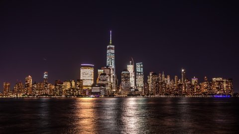New York, USA - September 22, 2016 : Lower Manhattan, Wall Street view from New Jersey time lapse at night