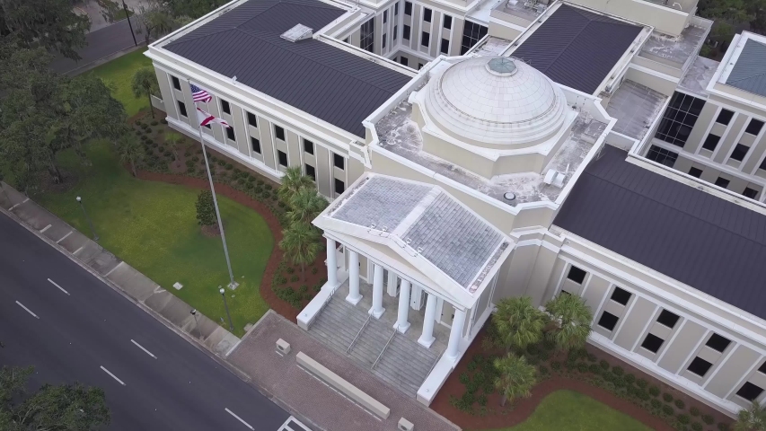 Flying over Florida Supreme Court Building and flag pole, Tallahassee, eagle eye.