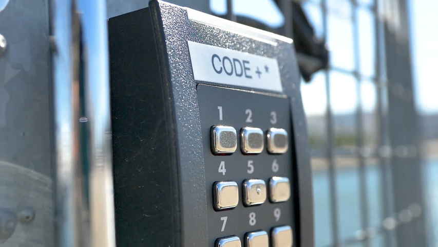 The closer look of the code numbers on the gate from the harbor port area