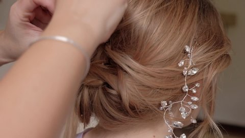 Hair stylish hands organizing bride haircut curl close up view