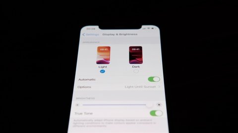 iOS 13 Dark Mode/Theme settings on Apple iPhone X, display and brightness, iOS & iPadOS update 2019