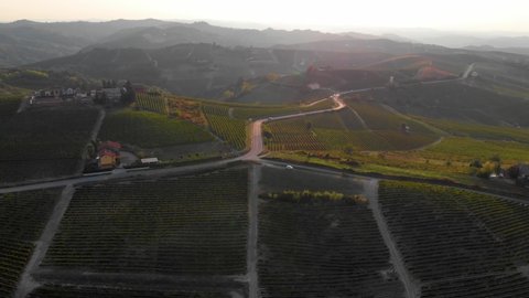 Aerial view of Italian vineyards in Piedmont langhe monferrato roero region green wine tasting area and bales of hay. Italy