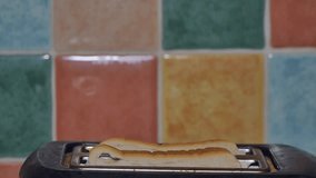 This is a short clip of bread that has been toasted popping 