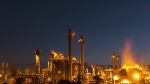 Timelapse night light oil refinery terminal is industrial facility for storage of oil and petrochemical. oil manufacturing products. power electric plant. footage video 4k.