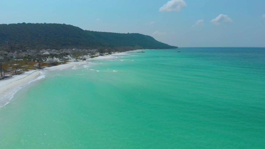Koh Rong Long Beach. Drone fly over white sand beach and turqoise water in a tropical paradise in Cambodia