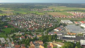 Aerial view of the village Herrieden in Germany, Bavaria  on a sunny day in summer. Wide view with high descend beside the city.