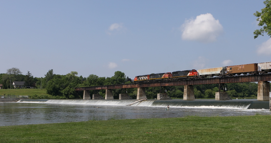 Train crossing bridge in Caledonia, Canada 4K 