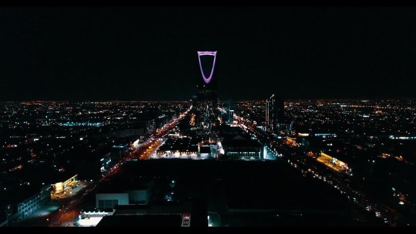 Riyadh, Saudi Arabia - September 16- A drone shot for Riyadh city night time showing kingdom tower.  Royalty-Free Stock Footage #1037201420