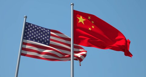 China and USA flag on flagpole. 4K 60fps. China and The United States of America waving flag in wind. China and US Trade War.