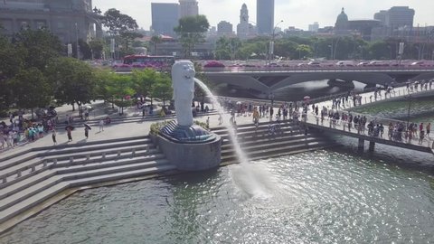Aerial drone travelling shot of Merlion Park in Marina Bay Singapore - Circa Aug 2019