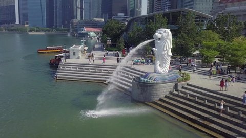 Aerial drone travelling shot of Merlion Park in Marina Bay Singapore - Circa Aug 2019