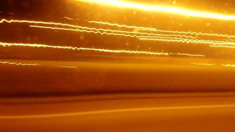 Abstract Light Long Exposure of fast cars on highway at night