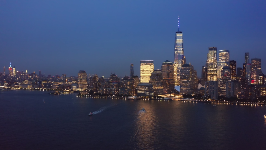 Drone footage with slow rotation in front of New York City skyline on September 11. Royalty-Free Stock Footage #1037228888