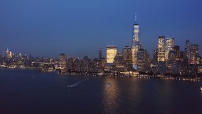 Drone footage with slow rotation in front of New York City skyline on September 11.