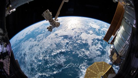 Time lapse video from International Space Station ISS showing cloud covered waters of the Pacific Ocean and heads toward the western coast of North America. Created from images by Nasa Public Domain.