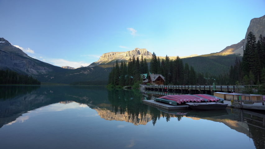Glass Like Reflective Waters Through idyllic Emerald Lake, Canada. STATIC SHOT