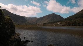 Colorful 4K time lapse video of scenic Kerry mountains, with moving clouds and shadows, Ireland