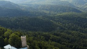 Aerial view around the Yburg Castle in Germany.  Early on a sunny morning in summer. Pan to the right beside the castle.