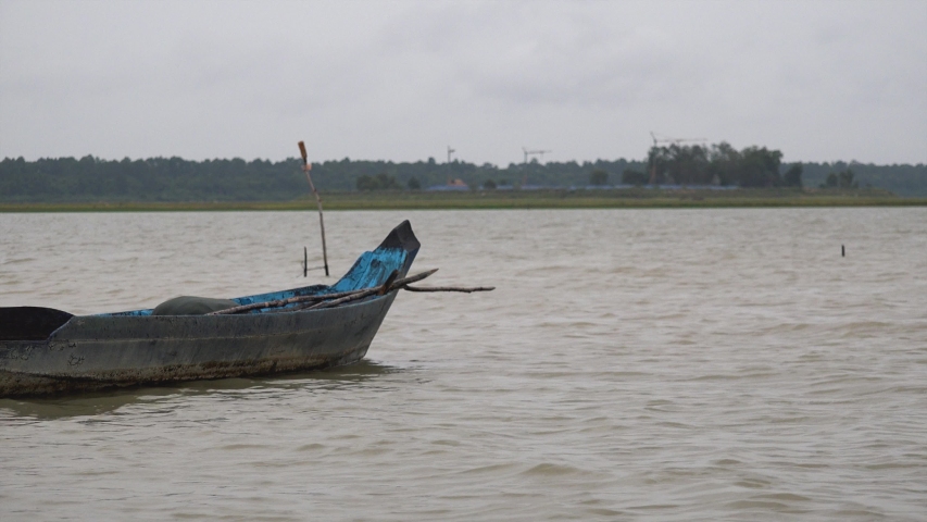 Fishing Boat Floating on The Lake