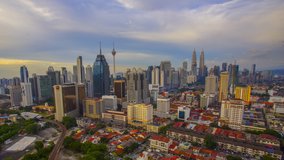 4K Timelapse of Kuala Lumpur city during sunset. Pan Left effect