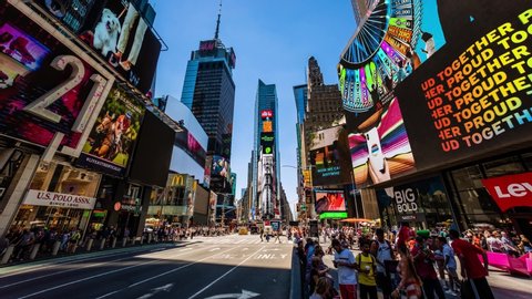 Times Square New York City Daytime Timelapse. High dynamic range 4K super fine timelapseby raw photo files. Crazy busy people, traffic and LED walls of advertisements. New York, 