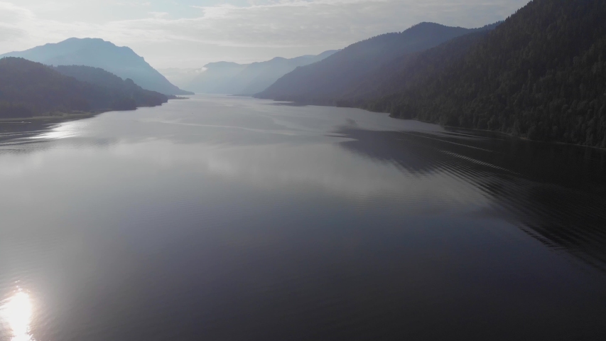 Aerial view of Lake Teletskoe, sunny summer morning, Altai mountines, Russia