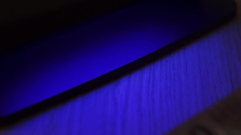 warsaw / Poland - 07 11 2019: Placing a Hungary 2000 Forint Note under UV light to check for counterfeiting, LOCKED OFF