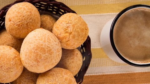 Brazilian cheese buns . Table coffee in the morning with cheese bread. Top view with smoke.