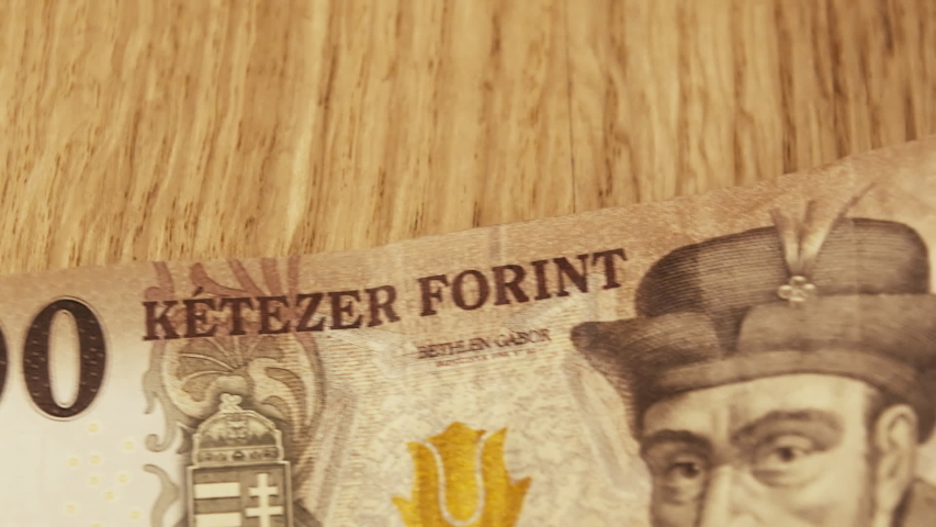 Hungarian ezer forint 1000 denomination notes layed on a table, closeup