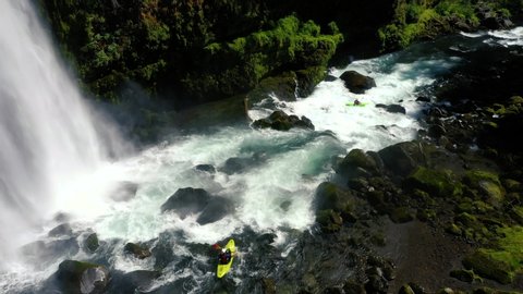 Aerial view of whitewater kayaker running class IV rapids on the Mill Creek section of the Rogue River in southern Oregon.
