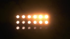 Orange flashing Lights Wall with smoke and particles. Various Looped Animations. Stage lights 7x4. VJ Floodlight Lights Flashing Wall. Shiny lights turning on and off. - Powered by Shutterstock - Get 15% off with code: PIKWIZARD15