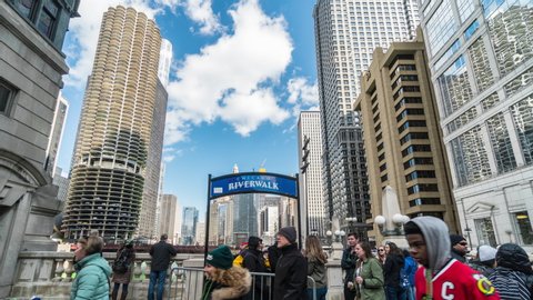 Chicago, Illinois, USA - March 16 2019 : Chicago Riverwalk with undefined various tourists in Downtown Chicago at Michigan avenue on March 16, 2019, United States.