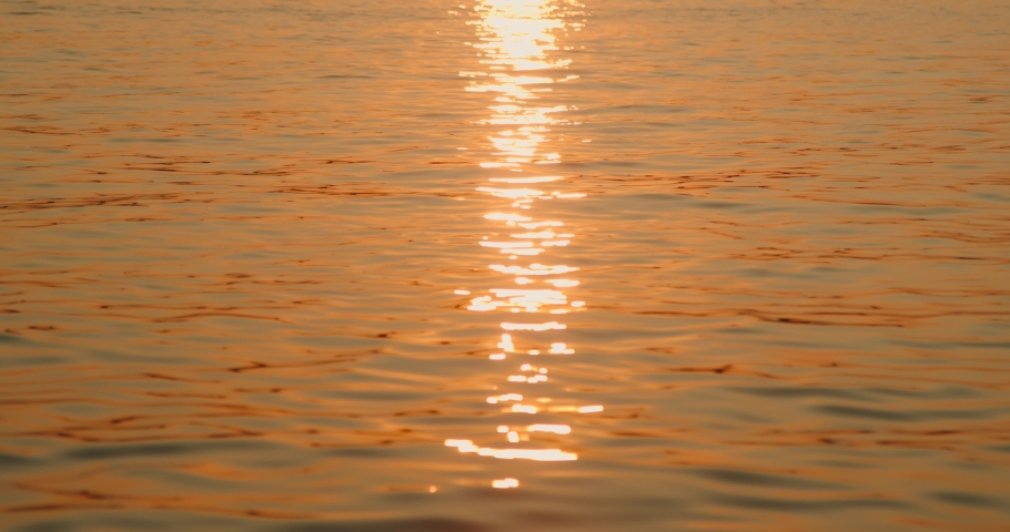 Sunset over ocean slow motion