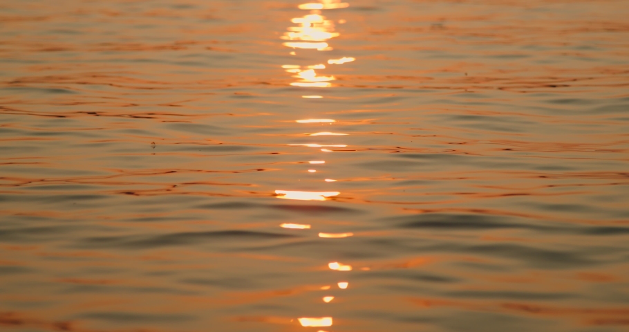 Sunset over ocean slow motion