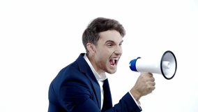 slow motion of businessman screaming in megaphone isolated on white