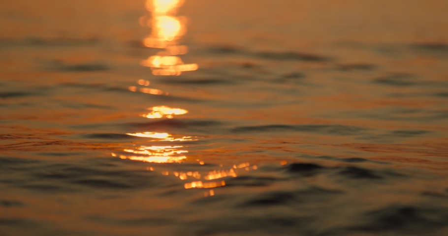 Sunset over ocean slow motion