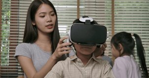 Young boy Wearing Virtual Reality Headset Works in Virtual Reality Simulators. Surprised little boy looking in VR glasses. Technology, Science and People Concept.