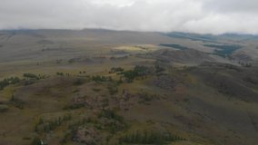 Aerial video of the Kurai steppe between the Kurai and the North Chuia Ranges in the south-eastern Altai, Siberia, Russia