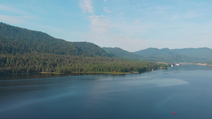 Aerial view of Lake Teletskoe, sunny summer morning, Altai mountines, Russia