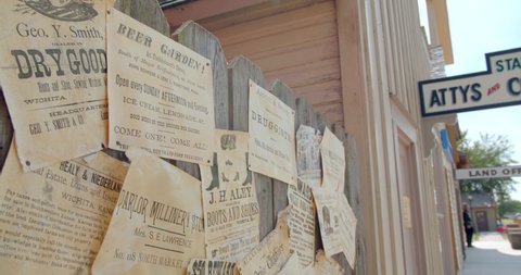 Old Cowtown, Kansas / USA - June 11, 2019: Wanted Posters in Old Western Cowboy Town, Movie Set, Ranch Town