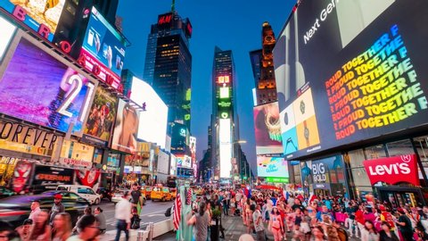 Times Square New York City Night Timelapse. High dynamic range 4K super fine timelapse by raw photo files. Crazy busy people, traffic and LED walls of advertisements. 
New York, USA. July 9, 2019