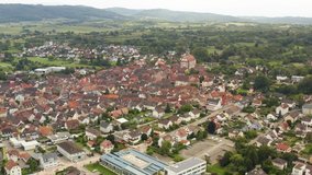 Aerial view of the old town of Ettenheim in Germany on a sunny day in summer. Very wide view zoom out.