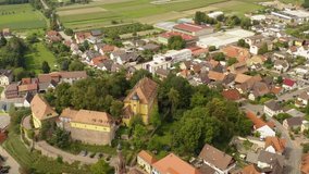 Aerial view of the city Mahlberg in Germany on a sunny day in summer. Pan to the right in the front of the palace.