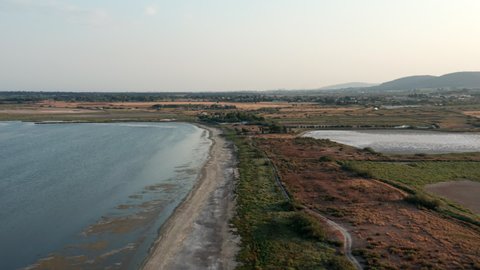 Aerial drone footage, pond beach near Montpellier, France.